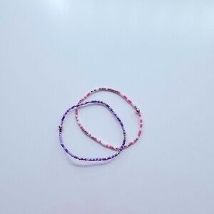 Enewton pink and purple bracelets